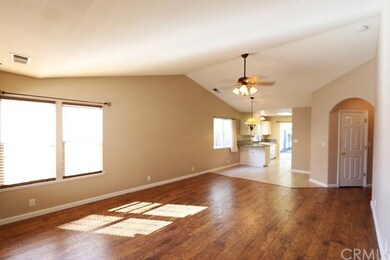 Beautiful new wood laminate floors in family room 