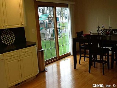 Dining Room. Off dining area, wooden glass slider 