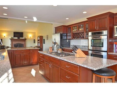 Kitchen. The kitchen is open to both...