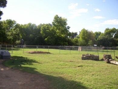 a livestock fence separates the space