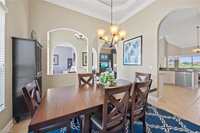 The formal dining room is open to the entry and kitchen.