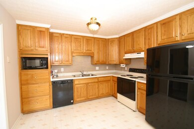 Country Kitchen with Oak Cabinets
