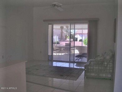 Living room with view of the patio