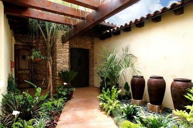 SERENE FRONT ENTRY WITH RECLAIMED WOOD FRONT DOOR 