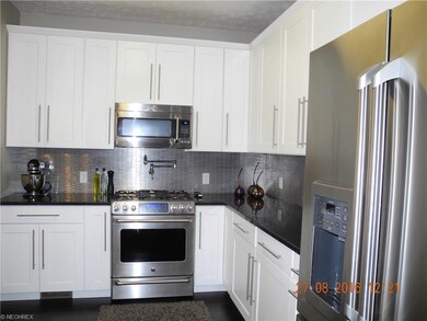 Over sized refrigerator.  Gas range with griddle i