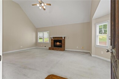 Unfurnished living room with a ceiling fan, health