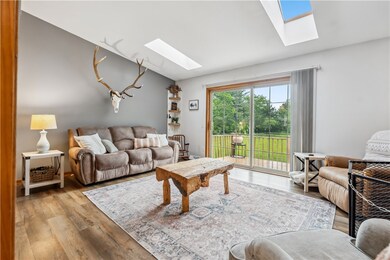Step inside this beautiful living room with a cozy