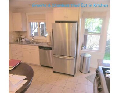 Kitchen. Tiled floor, new cabinets, all applianced