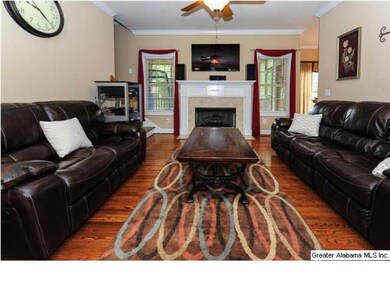 Hardwood floors ~ Ceiling Fan ~ Crown Molding