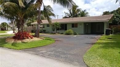 FRONT VIEW WITH CARPORT