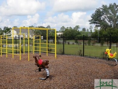 PLAYGROUND WITH VIEW OF LARGE LAGOON