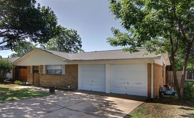 2 car garage with rain gutters