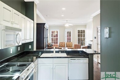 View of Kitchen and Dining Area and Living Room