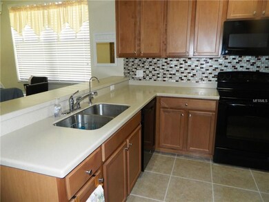 The clean, bright kitchen is ready for a new chef.