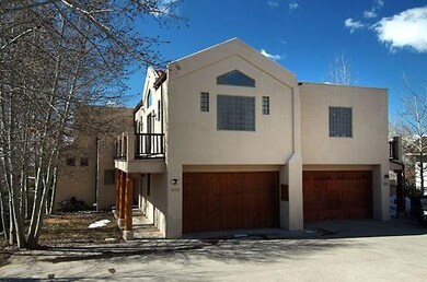 Over-sized 2-car garage with work area a