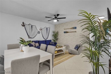 Tiled dining area featuring a textured ceiling and