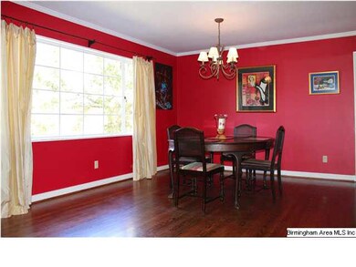 Dining room view with triple window. Offering grea