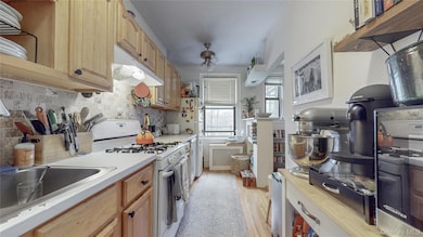 Kitchen with Window, wood-flooring
