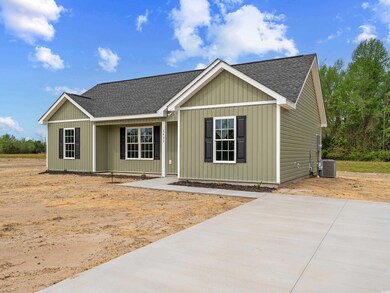 Ranch-style home with central AC, board and batten siding, and a shingled roof
