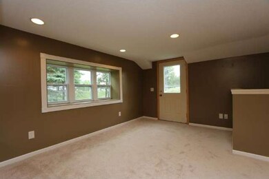 Main floor entrance steps into living room, comple