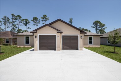 47 Providence Ln unit A, Palm Coast, FL 32164 - photo 2