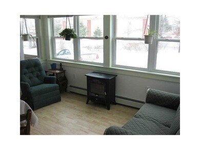 Sunroom. 1st floor, Unit 1