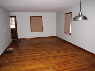 2 LIVING ROOM TOWARDS FRONT DOOR