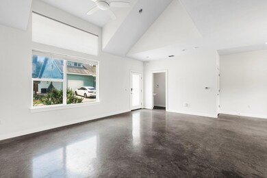 Unfurnished living room with a ceiling fan, baseb