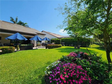 View of large, private backyard with a extended pa