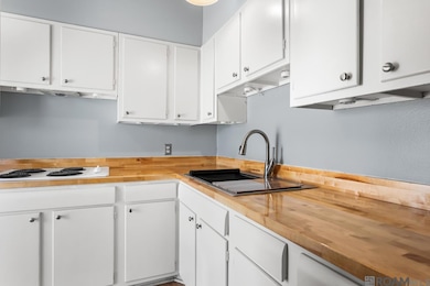 Updated Butcher/block Counter ~ New Kraus Kore Stainless/Double Workstation Sink ~ Freshly Painted Cabinets ~ Vaulted Ceiling