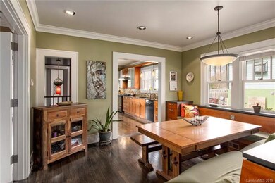 Dining room leads to kitchen and second bedroom