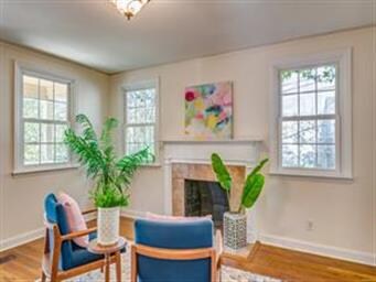 The Living Room has beautiful hardwood floors, a f