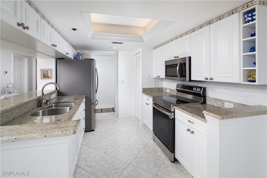 Kitchen featuring appliances with stainless steel