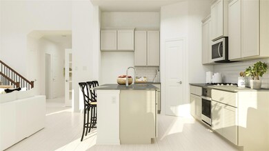 Kitchen featuring sink, decorative backsplash, lig