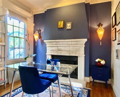 Fireplace with beautiful Venetian inspired pendent