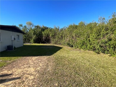 View of yard with cooling unit