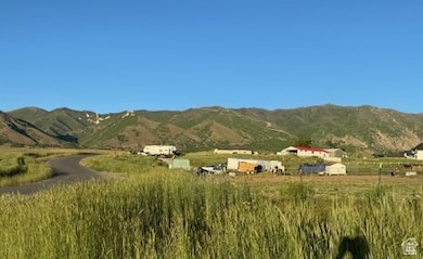 View of mountain background featuring rural landscape
