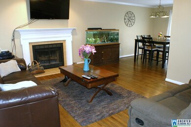 Hardwood floors, wood burning fireplace with tile 