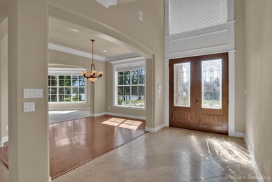 Front entry with travertine marble floors