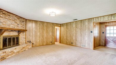 LIVING AREA WITH CEILING TO FLOOR BRICKED WOOD BURNING FIREPLACE~