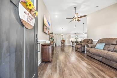 Living room featuring hardwood / wood-style floori