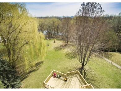 Huge park like back yard with pond views.