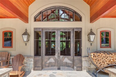 Welcoming entry with double iron doors