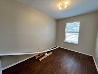 This view of a bedroom shows the lovely view from the window.