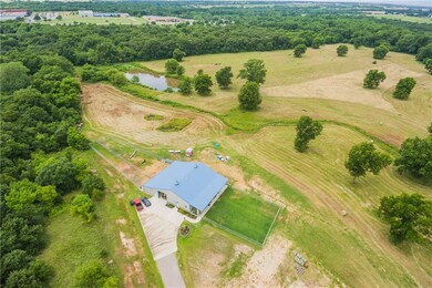 Over 43 acres of pecan trees, a beautiful pond, op
