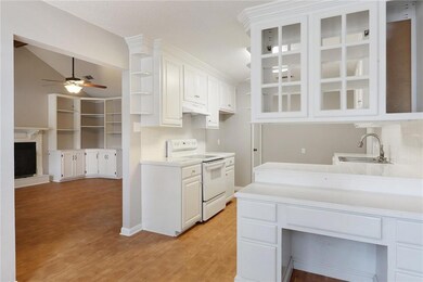 View of the living room and kitchen from the break