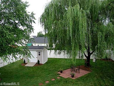 Yard/Garden. The lovely manicured backyard has privacy fencing, a shaded patio, an irrigation system, a storage shed, and offers a picturesque view!