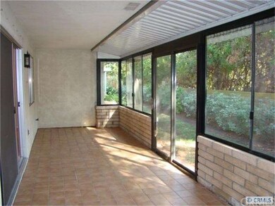 Tiled patio off living room