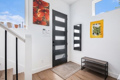 Bright and welcoming entryway.