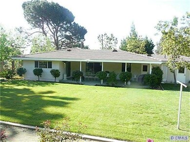 View of back grass area and back patio